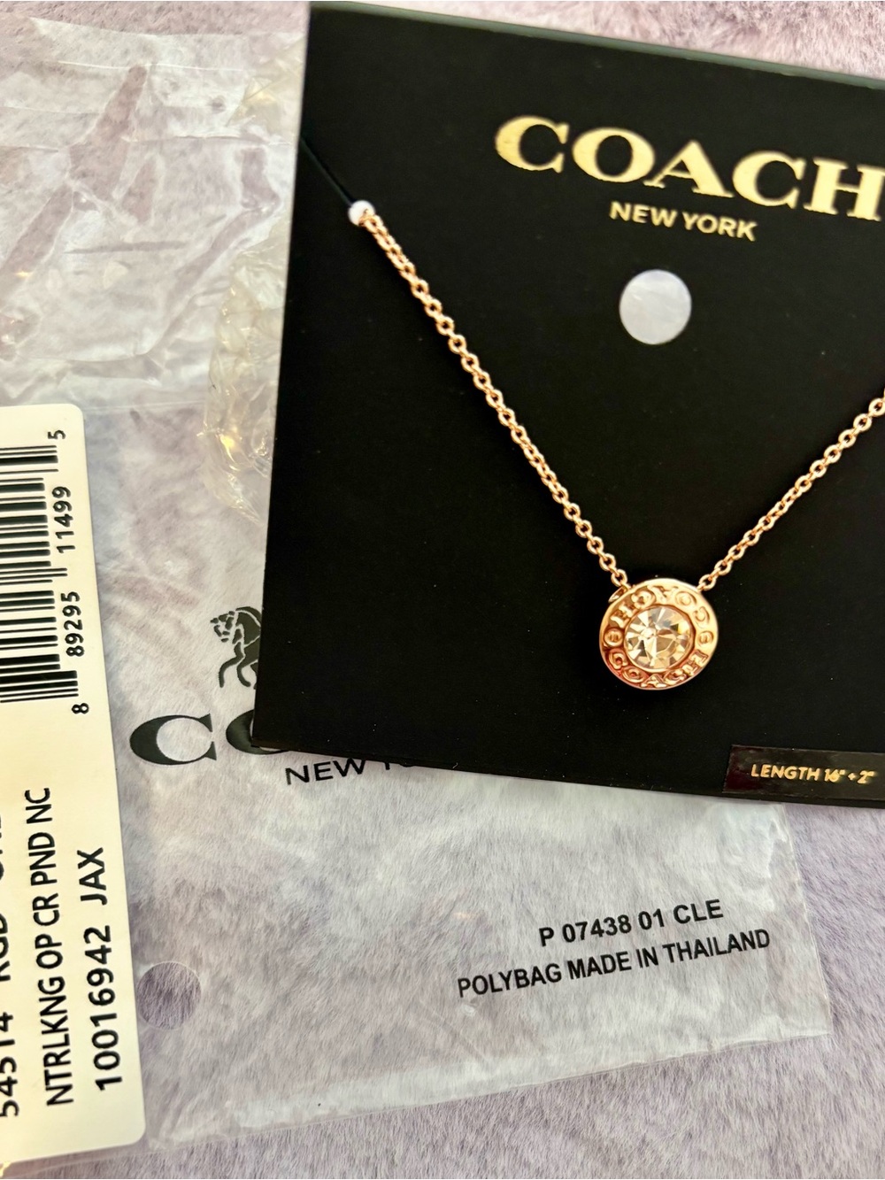 COACH Rose Gold Crystal Round Pendant Necklace